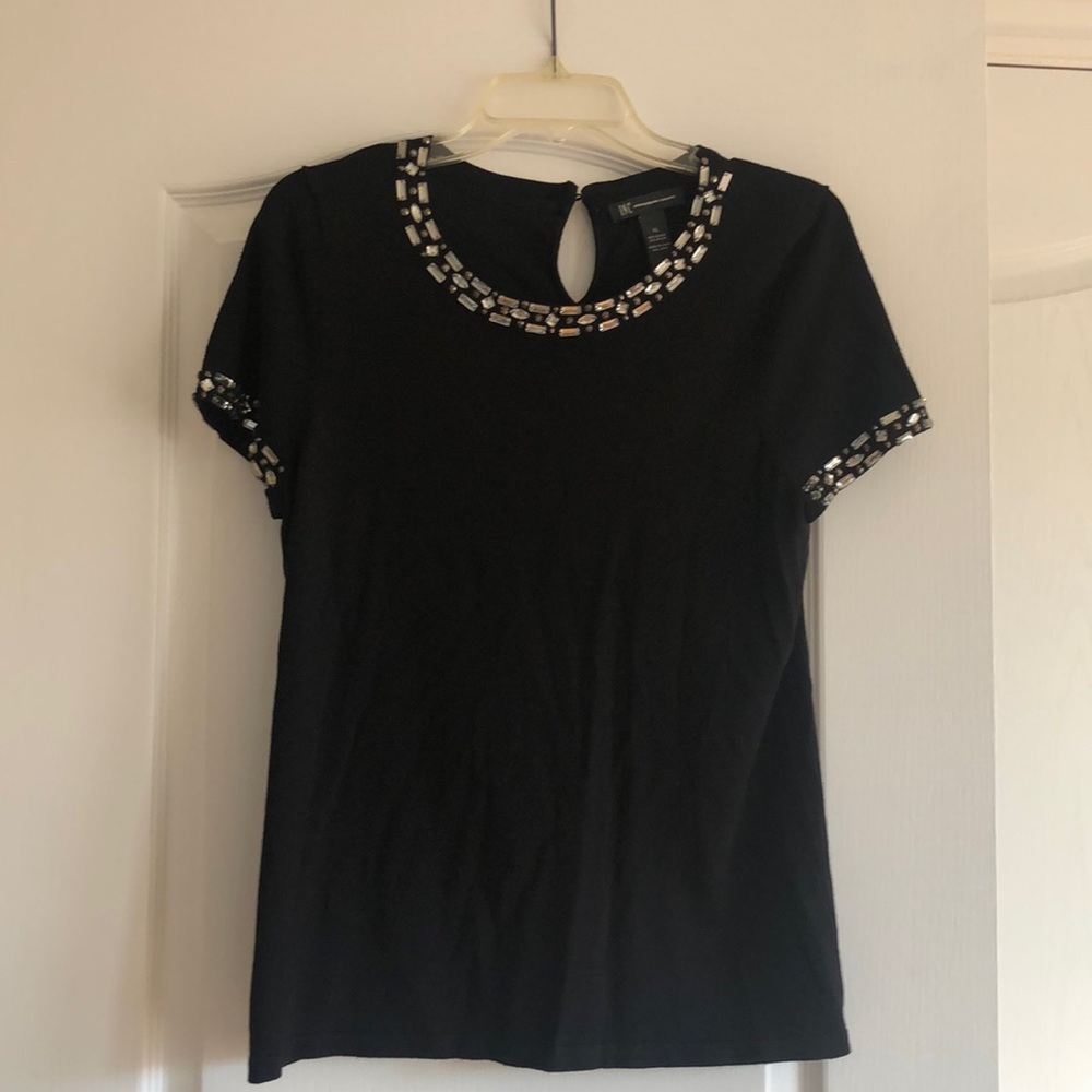 Black short sleeve sweater with jewels around the neck and sleeve